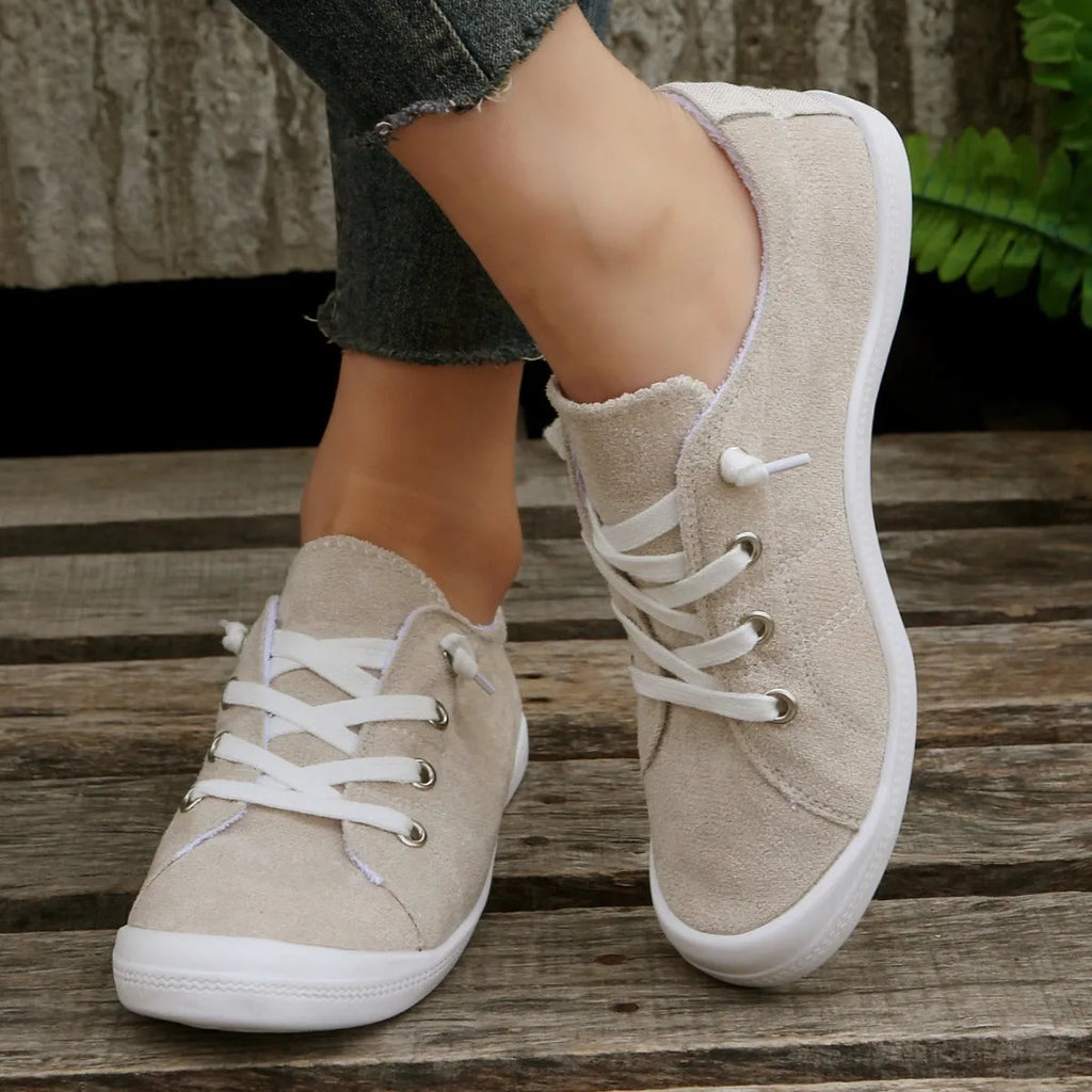 Women's creamy-white casual sneakers with fabric upper and rubber sole