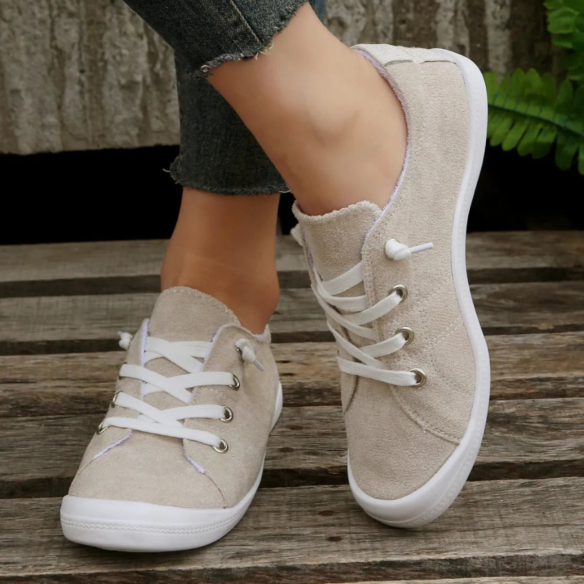 Women's creamy-white casual sneakers with fabric upper and rubber sole