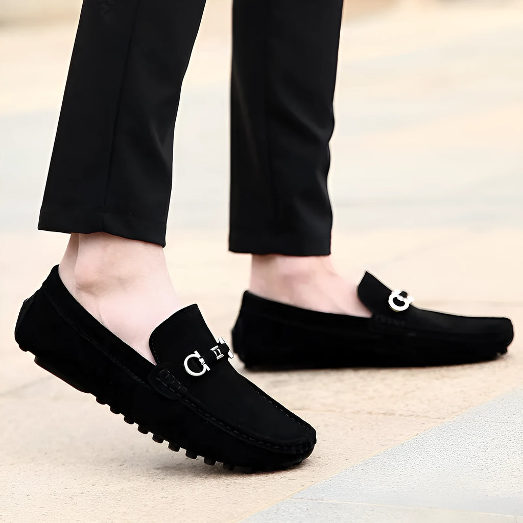 Men's black slip-on leather shoes with square toe and decorative stitching