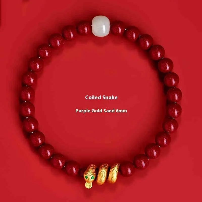 Handmade Chinese Zodiac snake charm bracelet made from cinnabar, showing 8mm beads.