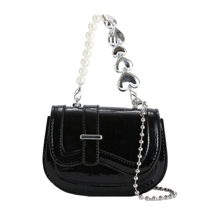 Silver PU leather mini tote saddle crossbody bag for women with a single strap.