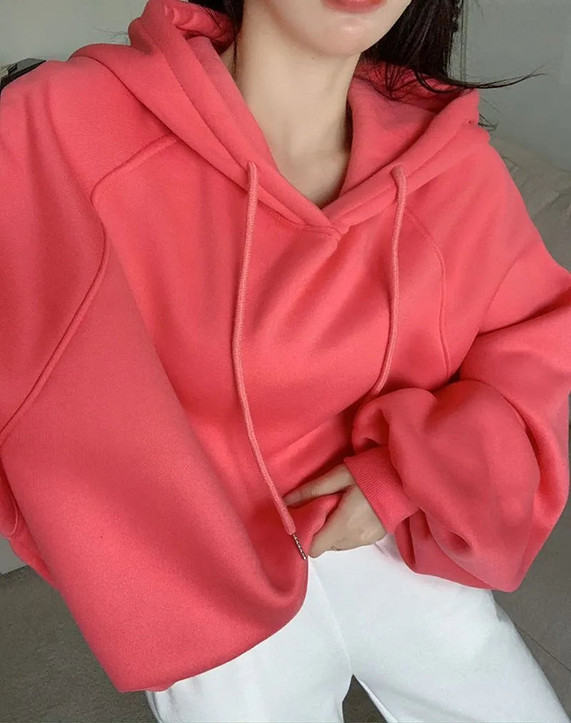 Women's loose mulberry silk hooded sweater in solid watermelon red, sleeveless design.