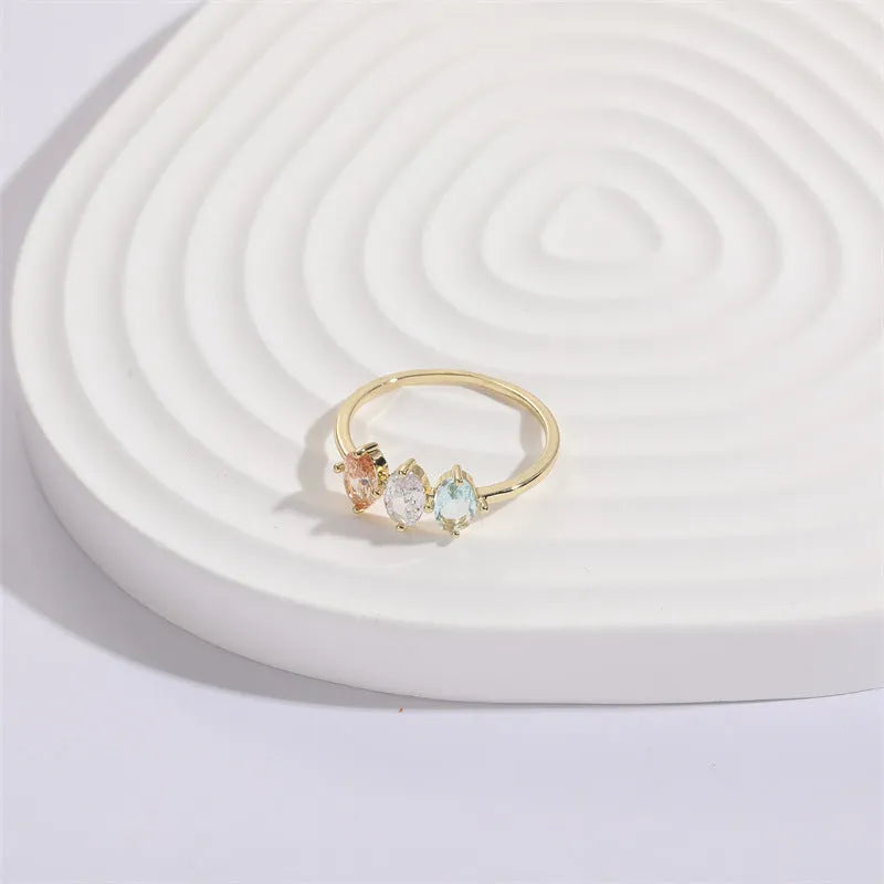 Mother's Day birthstone ring with triangle horse eye design and tricolor zircon stones in 14K gold plate.