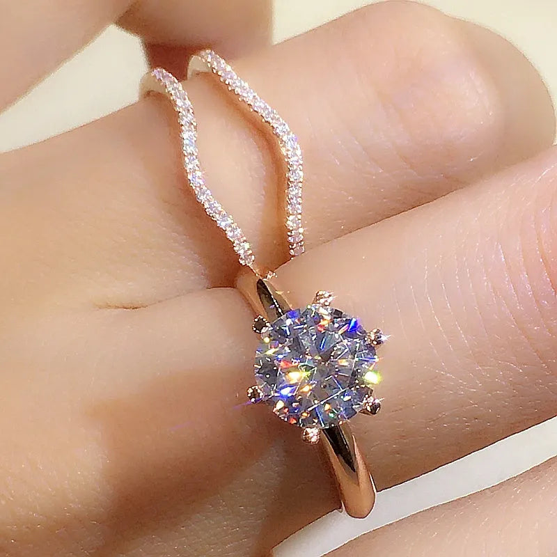 18K gold Mosonite matching ring with D colour stone in rose gold finish on white background