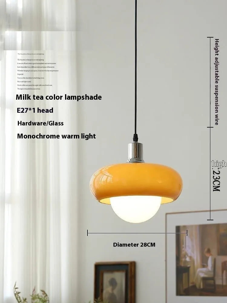 Bauhaus three-headed glass egg tart pendant light in retro style, shown in milk white.