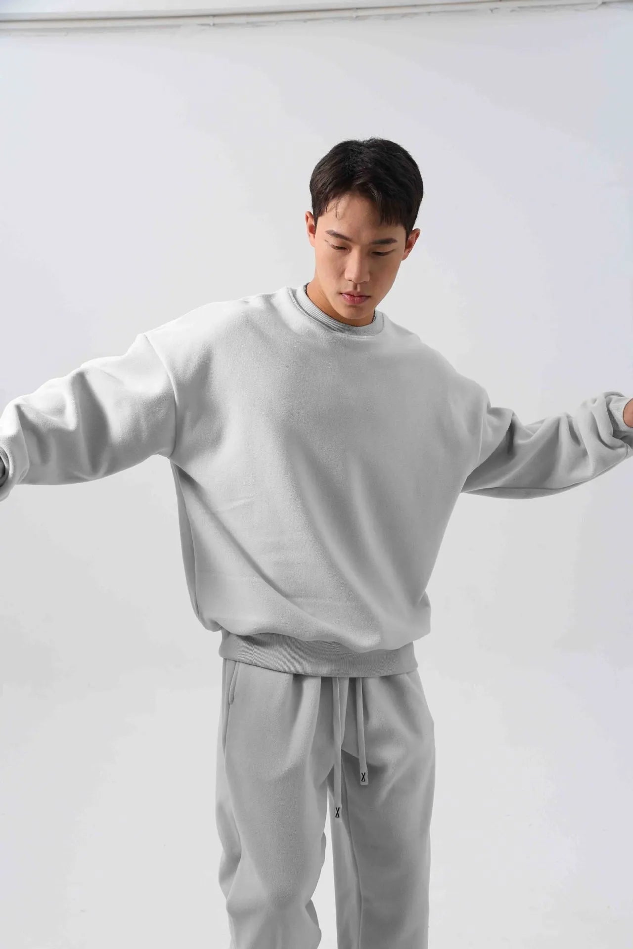 Men's polar fleece winter sports suit in five colour options showing crew neck top and matching trousers