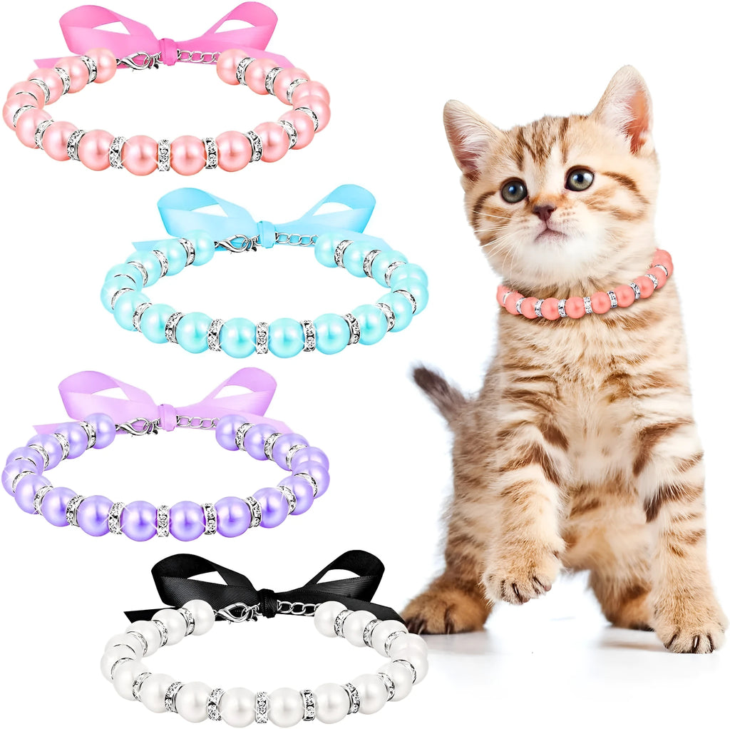 Small dog wearing adjustable pearl and rhinestone necklace with soft ribbon bow in blue colour