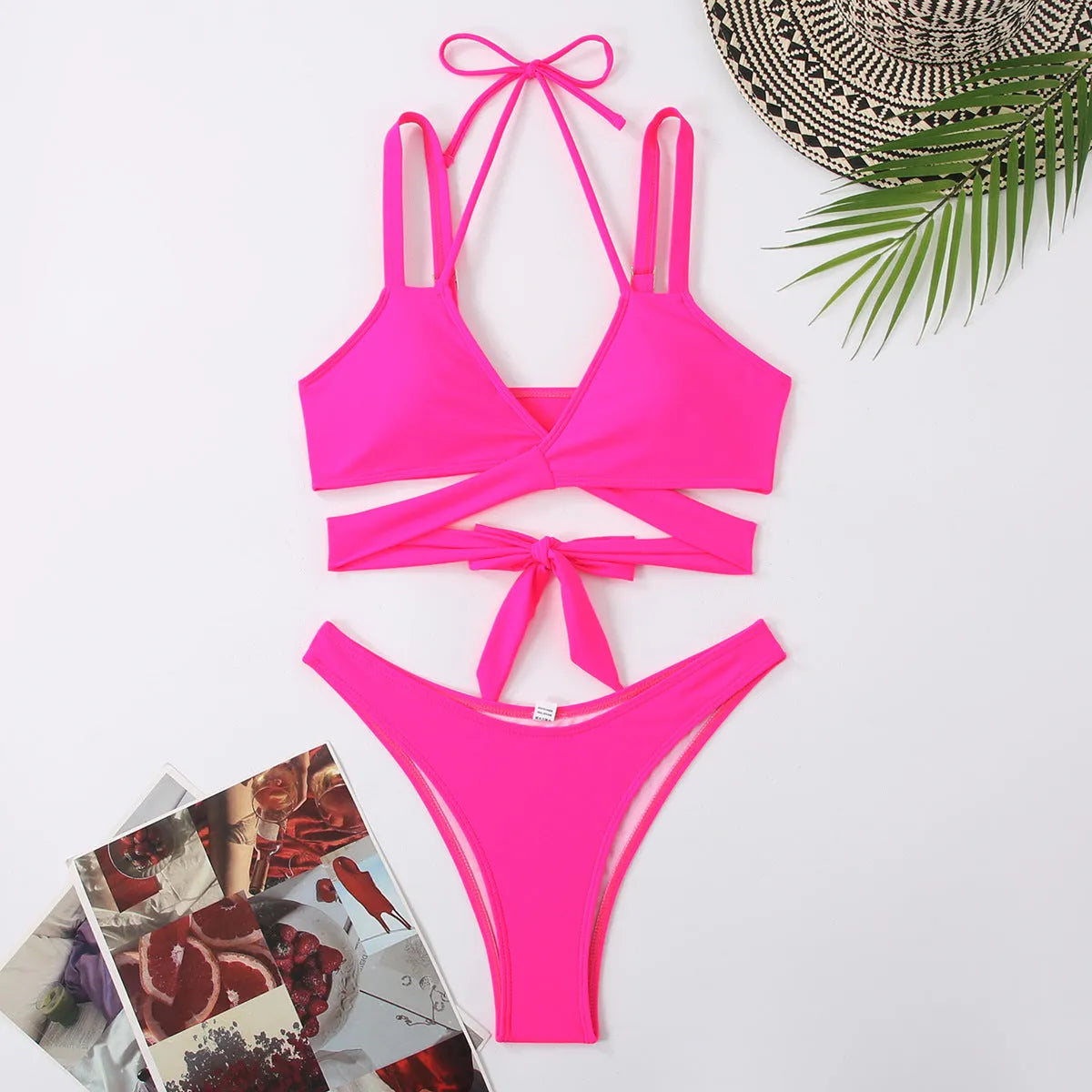 Women's solid colour strap bikini swimsuit in briefs style showing black, blue, red, rose red, and white colour options