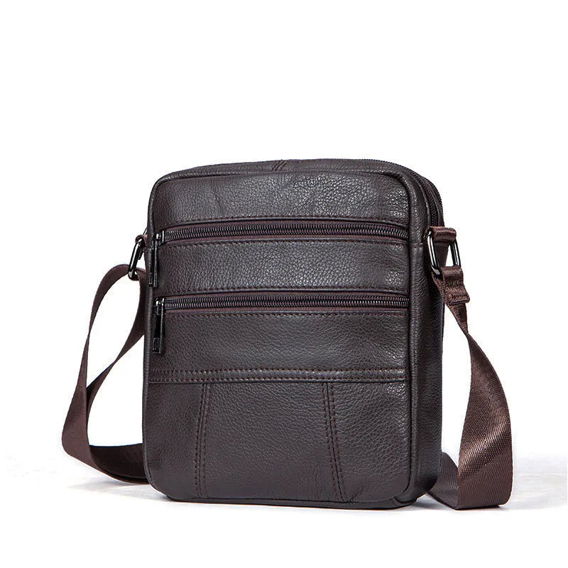 Vintage style genuine leather men's shoulder bag in vertical square shape showing internal organiser pockets
