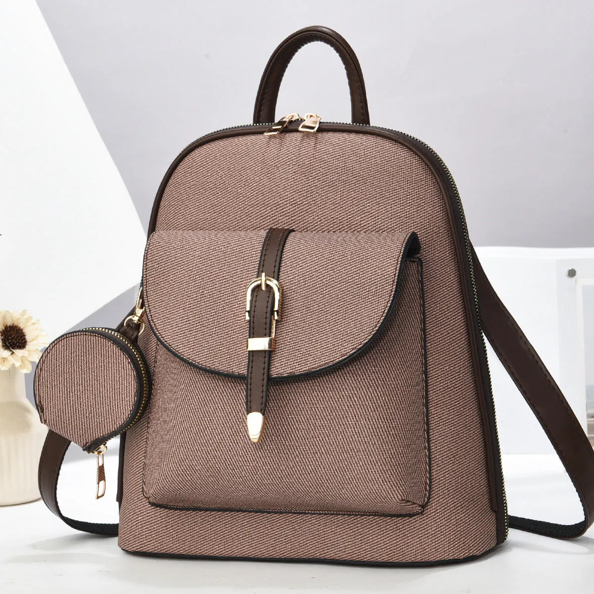 Multi-functional PU leather one-shoulder crossbody travel backpack in apricot, front view