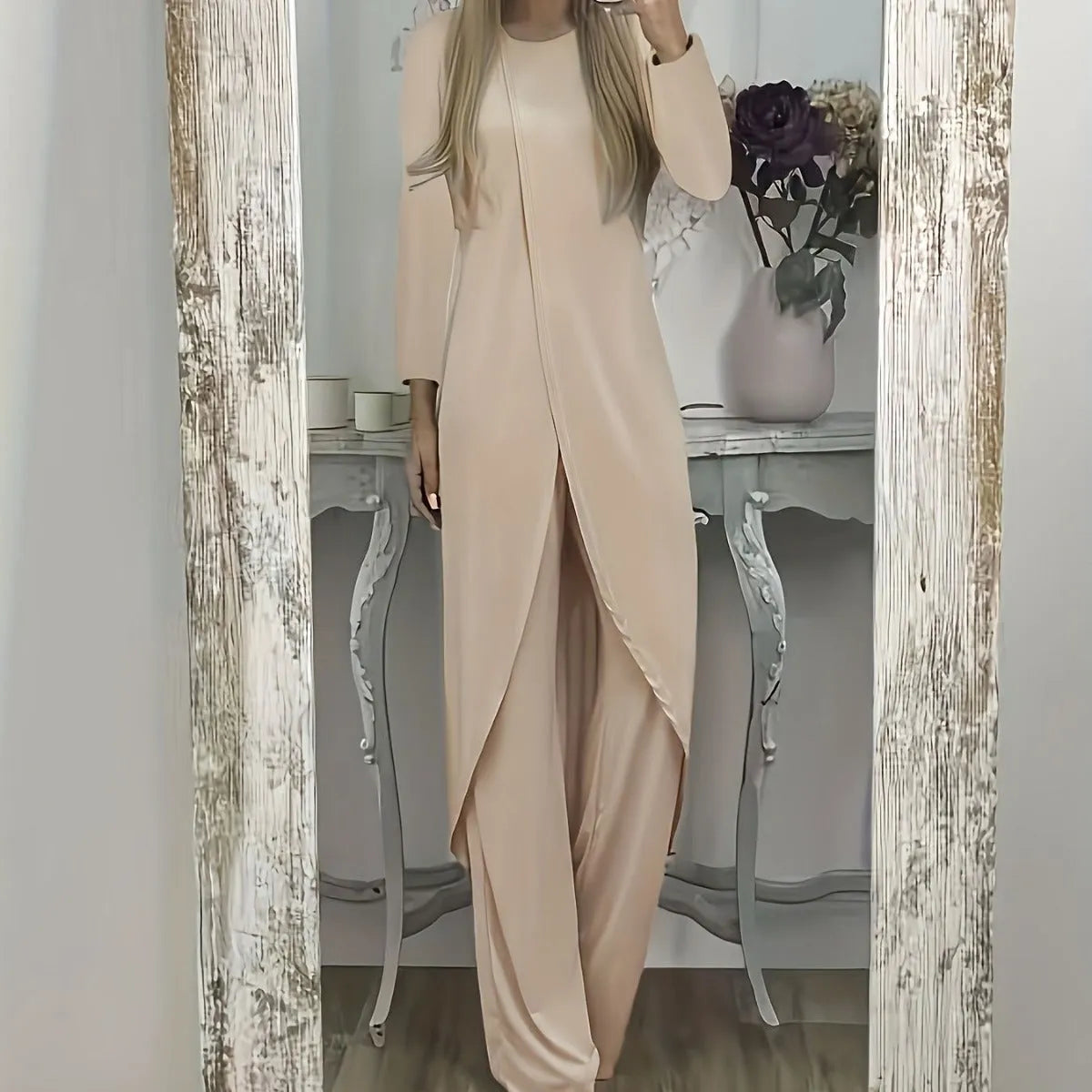 A loose-fitting long sleeve two-piece lounge set in polyester, shown in khaki colour, consisting of a round-neck top and matching trousers.