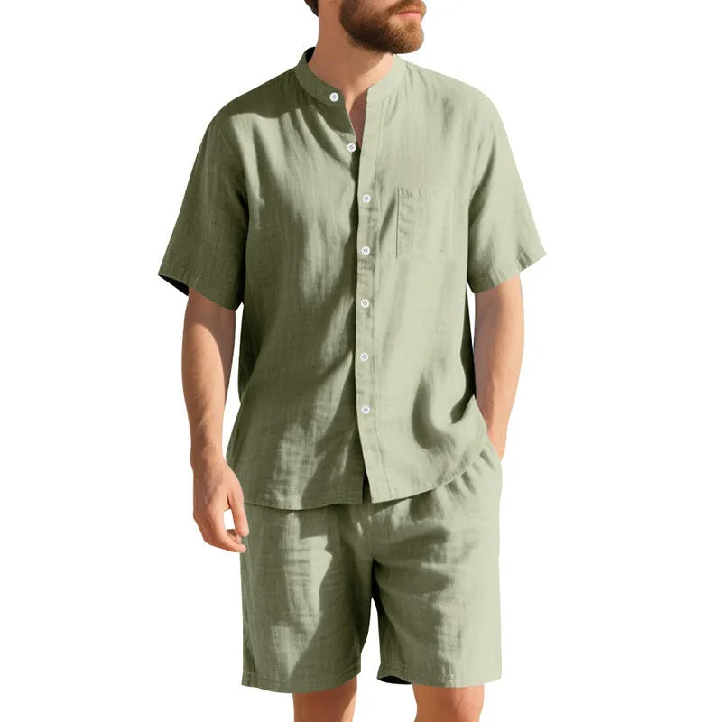Men's light blue linen-blend summer suit with short sleeve shirt jacket and matching shorts on a hanger.