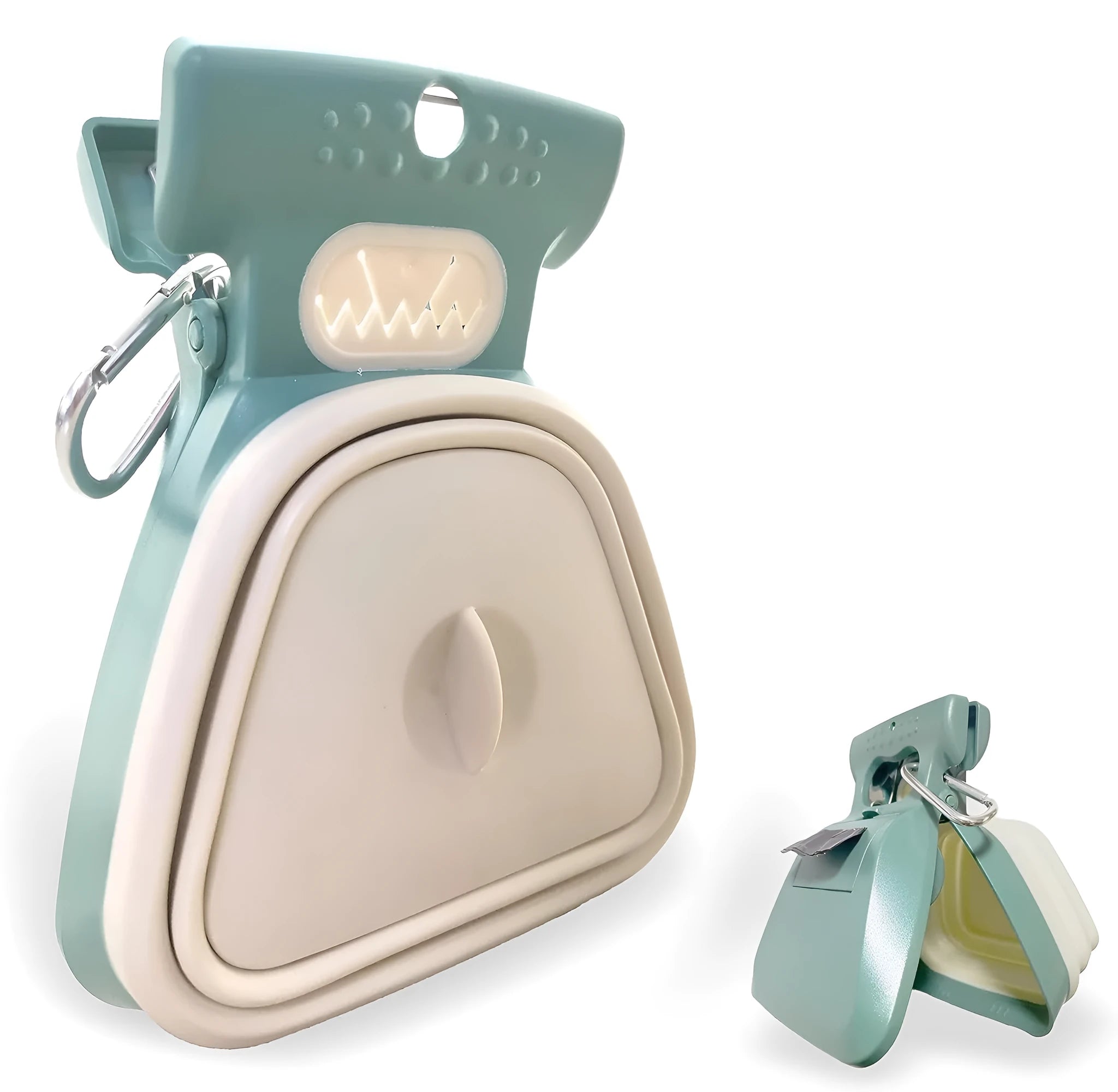Blue handheld dog pooper scooper with clip and bag dispenser on a green background.