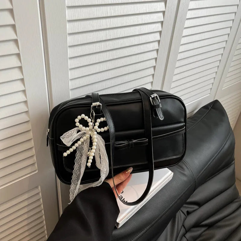 PU leather single-shoulder flap bag in urban simplicity style with bow stitching decoration