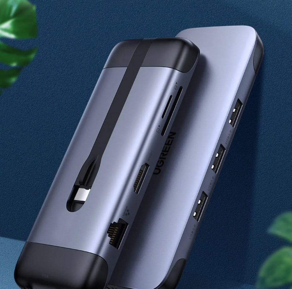USB-C dock expansion adapter showing multiple ports including HDMI, USB 3.0, and Power Delivery charging