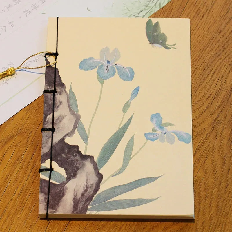 A5 antique wire-bound notebook with retro painting design on white cowhide cover