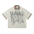 Men's loose fit cotton short sleeve top with asymmetric cut and graffiti print in blue or red