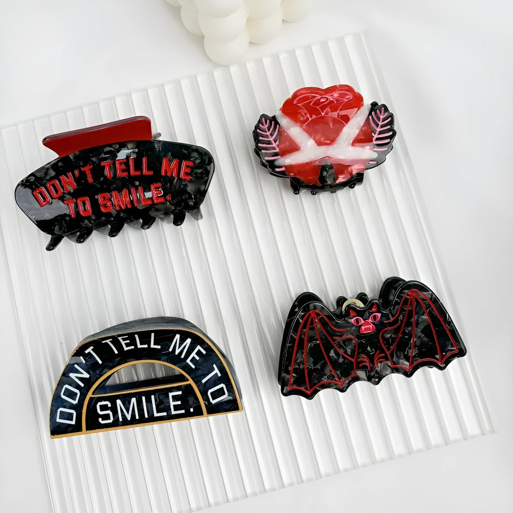 Handmade Halloween hair clip with bat design in four colour variations