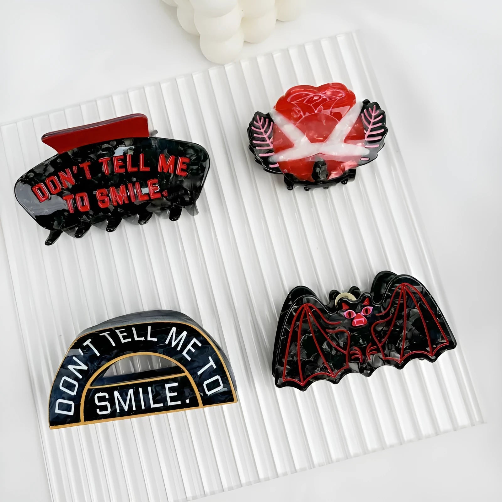 Handmade Halloween hair clip with bat design in four colour variations
