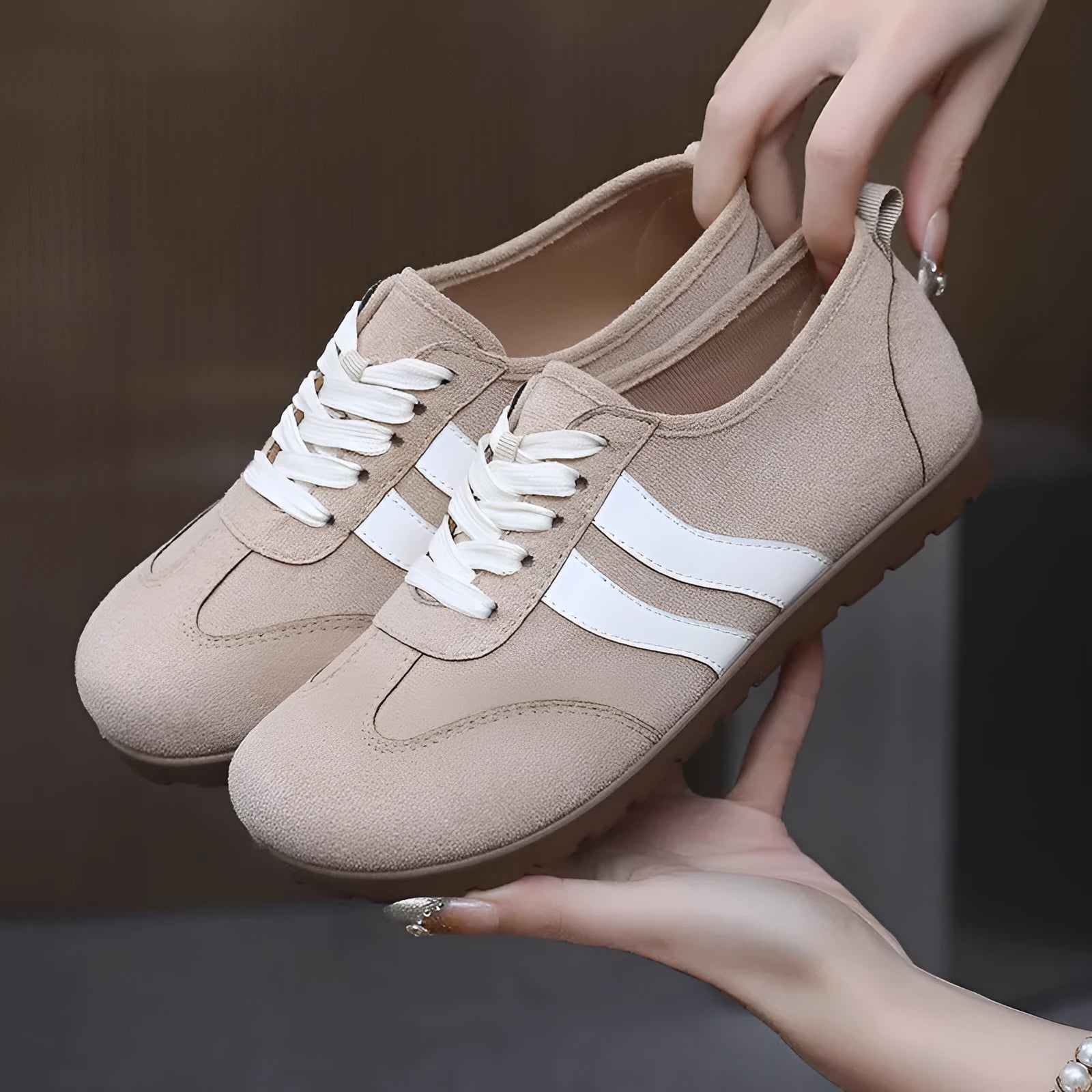 Women's vintage canvas sneakers in dark red and khaki with a round toe and flat rubber sole.