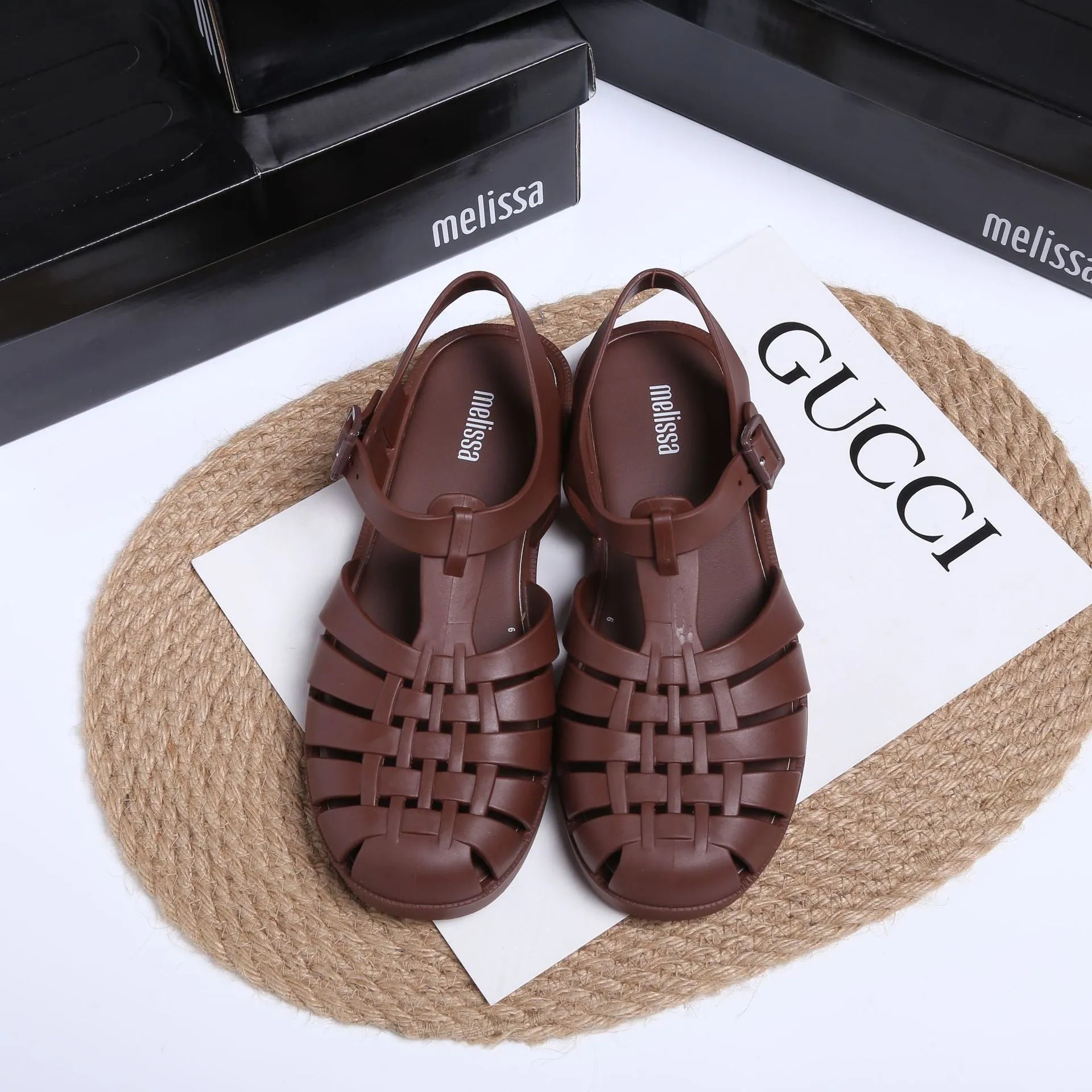 Vintage weave Roman sandals in black with buckle fastening and hollow out design elements