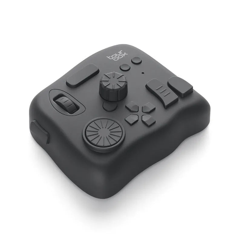 TourBox NEO black digital tablet auxiliary keyboard for video editing on a desk