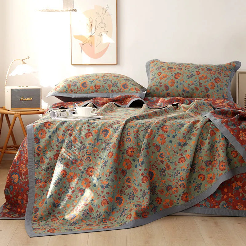 Cotton gauze three-piece bedding set with botanical plant and flower patterns including blanket and two pillowcases