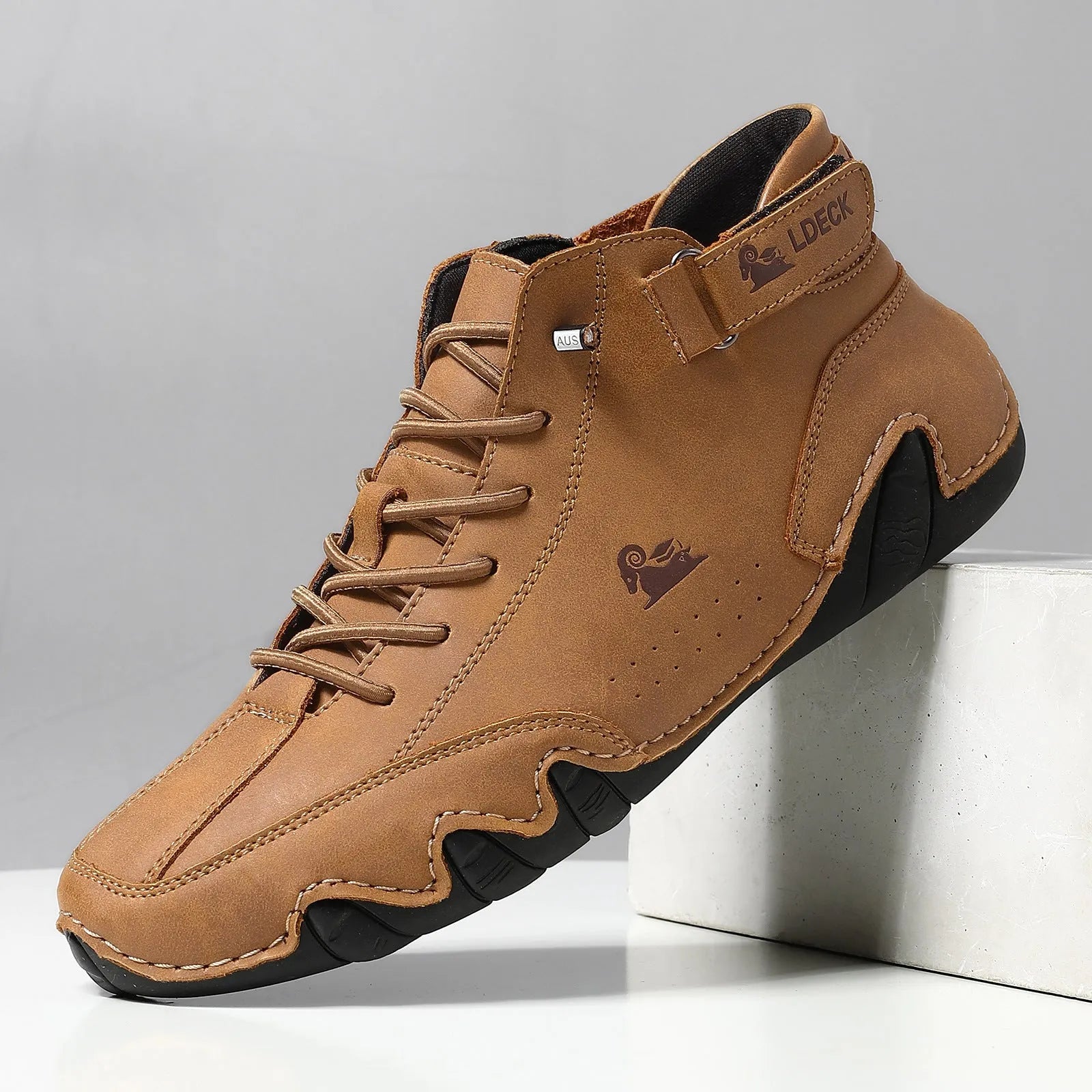 Men's khaki Octopus high top boots with microfiber upper, rubber sole, and pigskin boot tube on a white background.