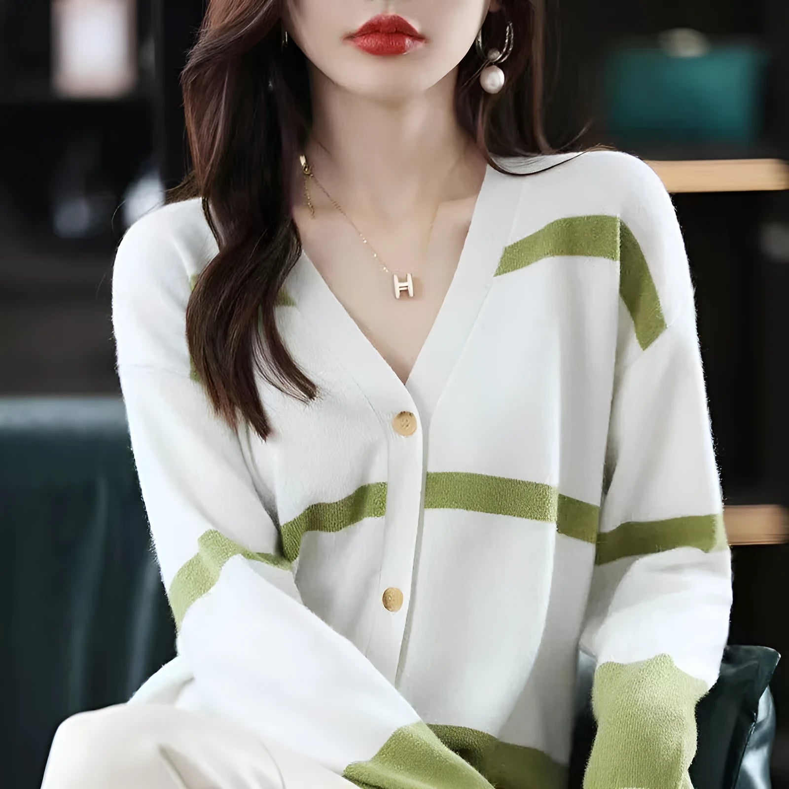 Women's striped V-neck knitted cardigan with 3D pattern in a slim fit, shown in multiple colour options.
