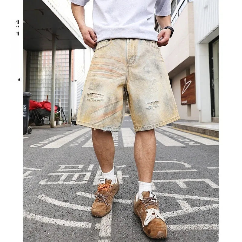 Light blue men's denim shorts with ripped detailing and a straight-leg cut