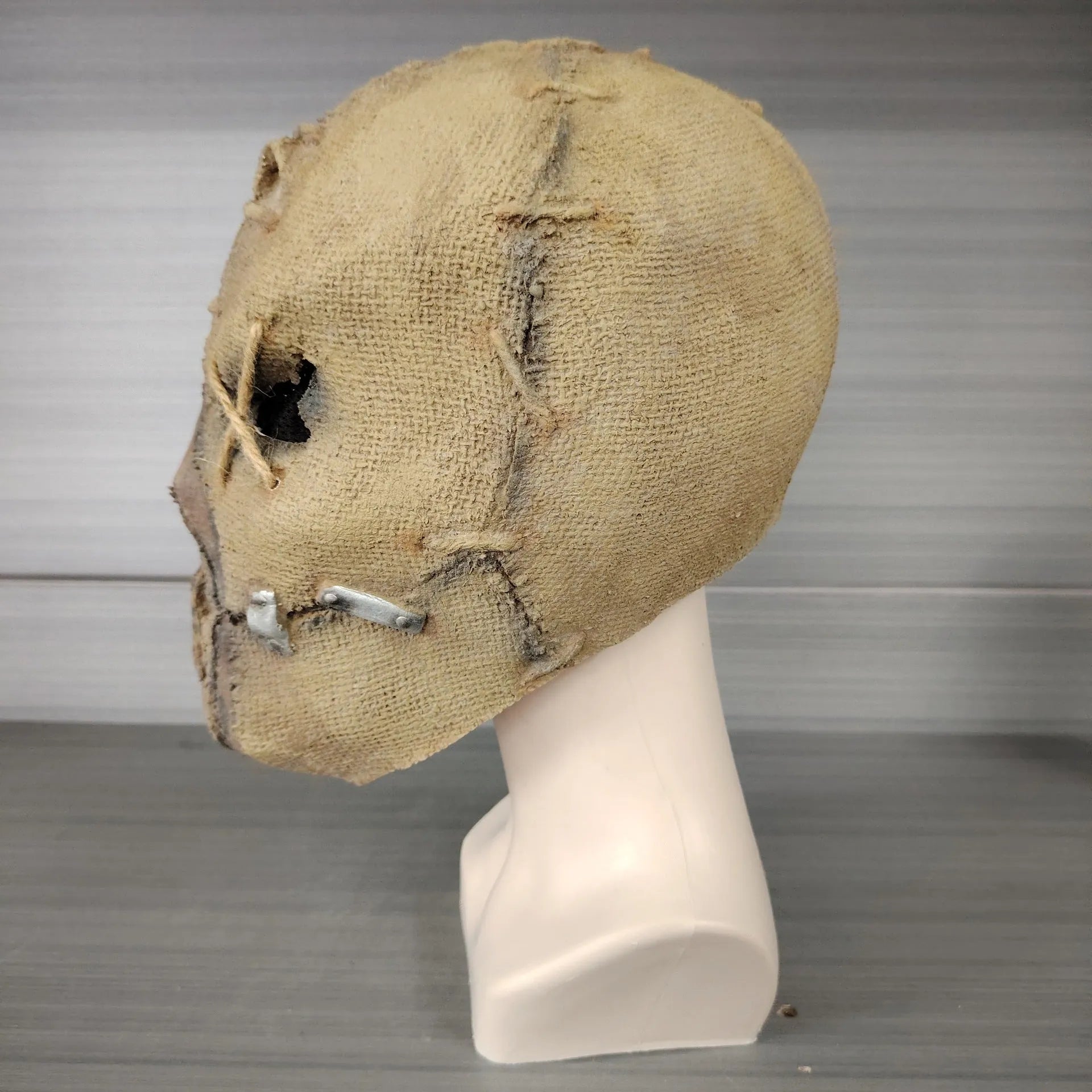 Latex Halloween mask with scar skull design, measuring 31cm tall by 25cm wide