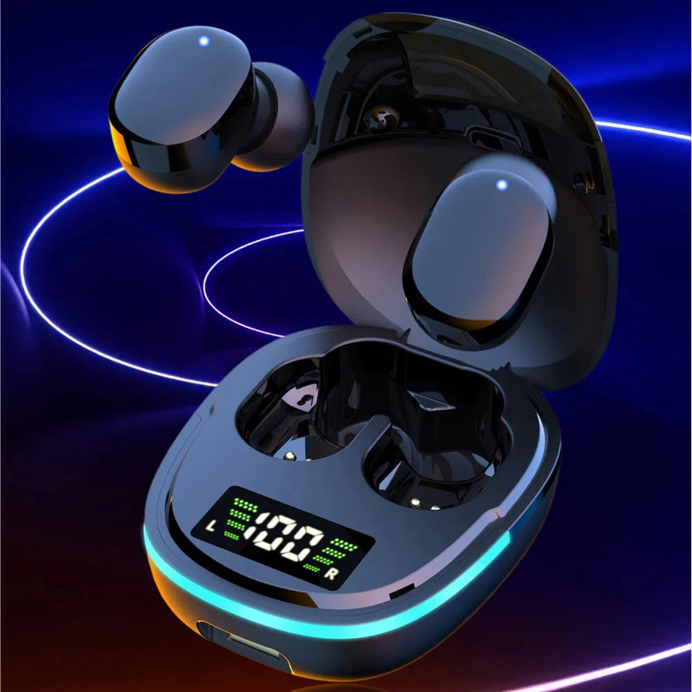 Black true wireless Bluetooth earbuds with charging case showing magnetic contacts