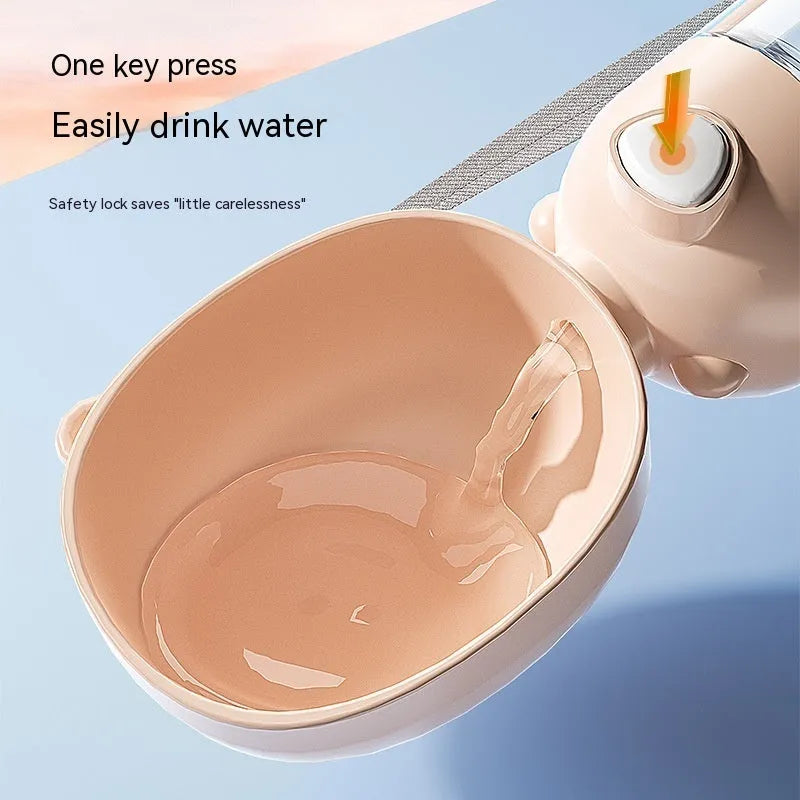 Portable plastic dog water bottle with attached feeding bowl in yellow colour