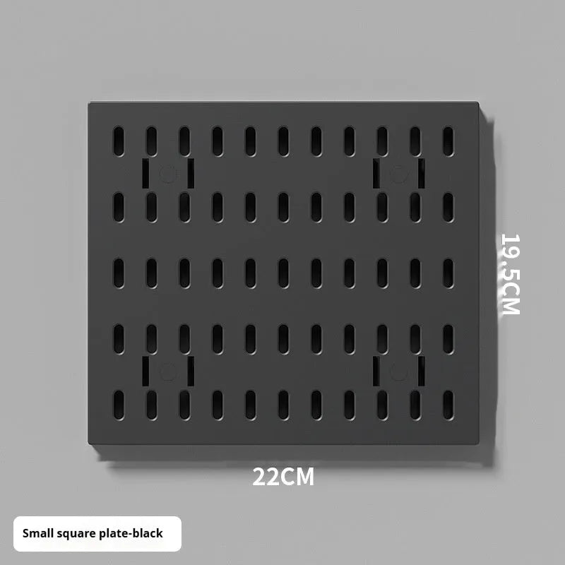 White punch-free plastic wire-wrap board storage rack mounted on a wall with hooks