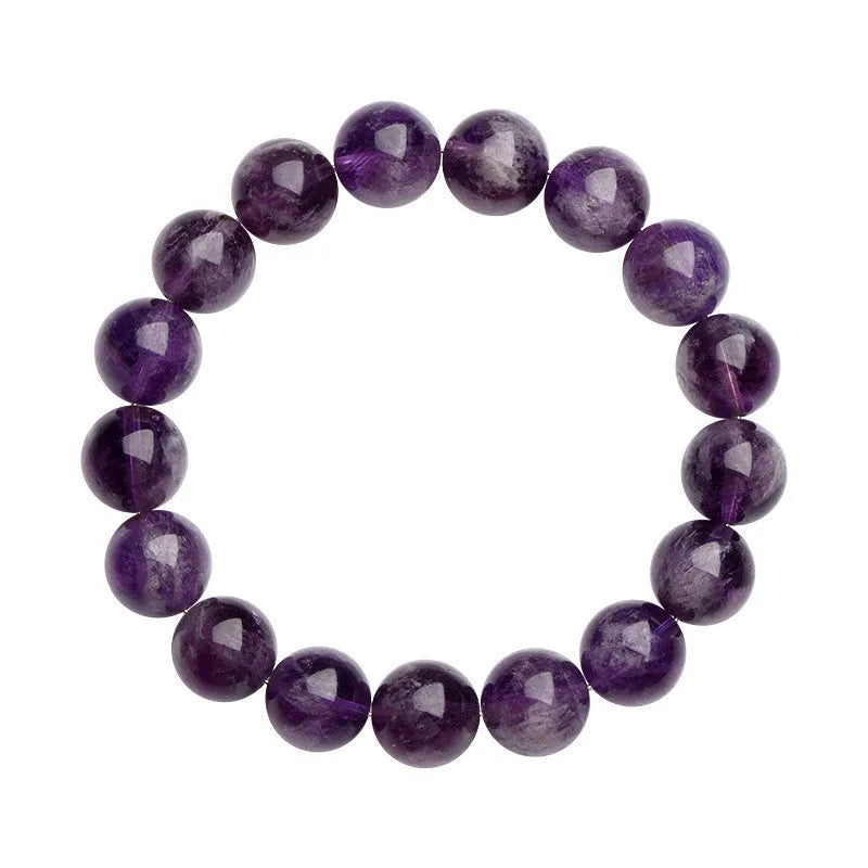 Natural Snow Mountain Purple Feather Amethyst crystal bracelet with scattered geometric beads featuring a Ruyi pattern.