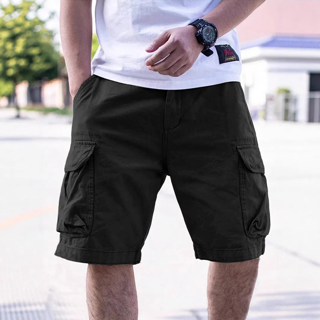 Men's loose fit cotton blend workwear shorts in army green on a mannequin