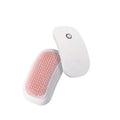 Pink electric pet massage brush with TPE comb teeth for grooming cats and dogs