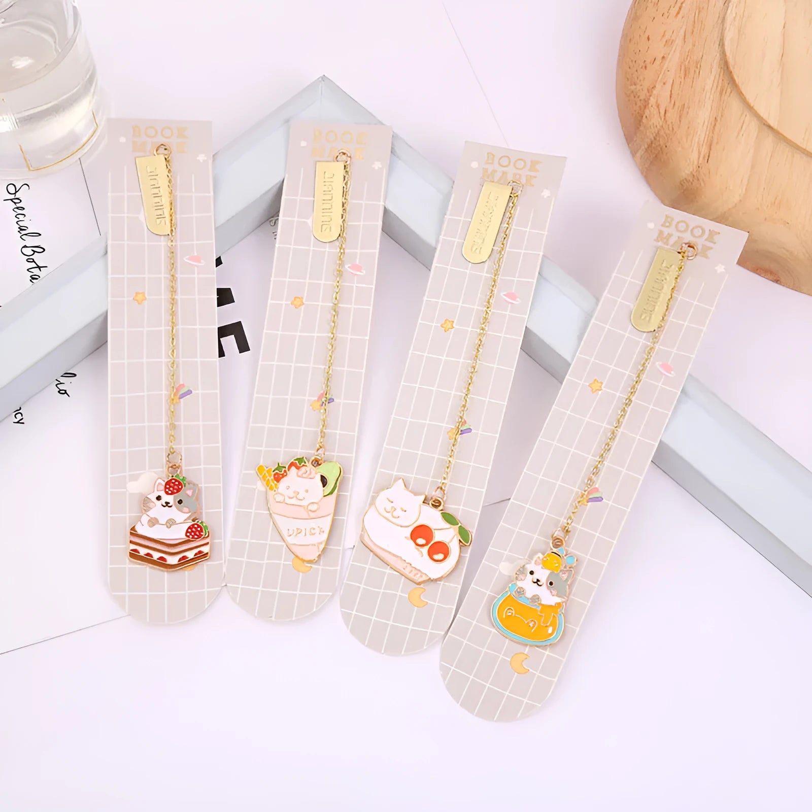 Jane Lime metal bookmark with cartoon cat pendant in four designs measuring 3.8x18.3cm
