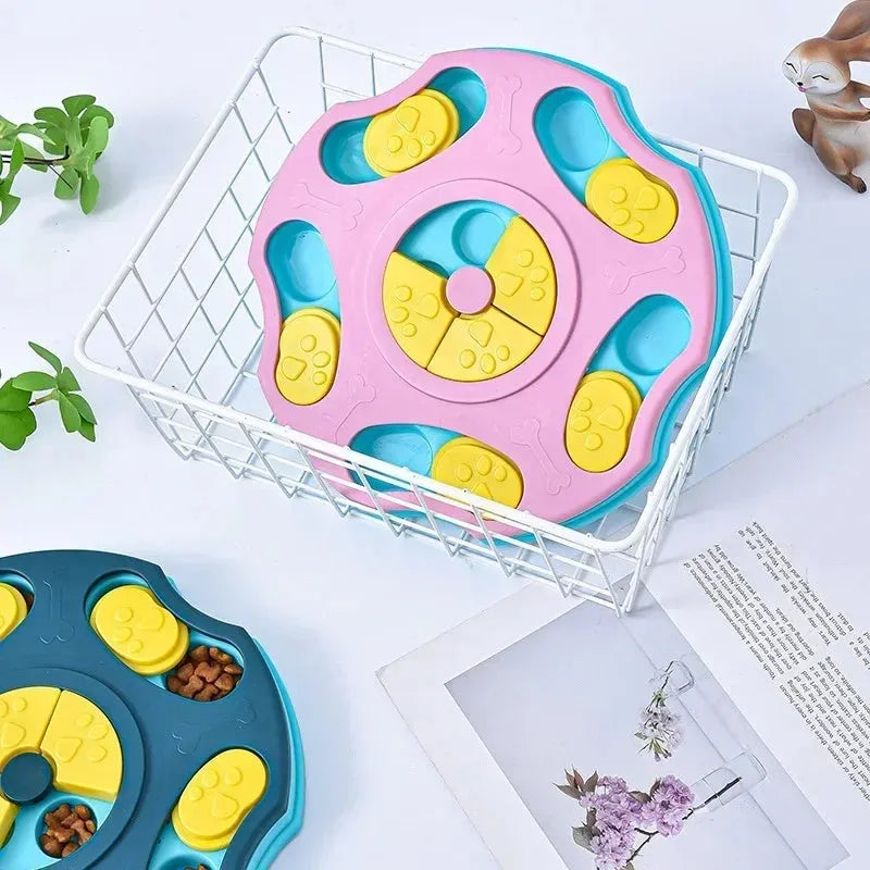 Blue and pink dog puzzle feeder toy with multiple compartments for interactive food searching gameplay