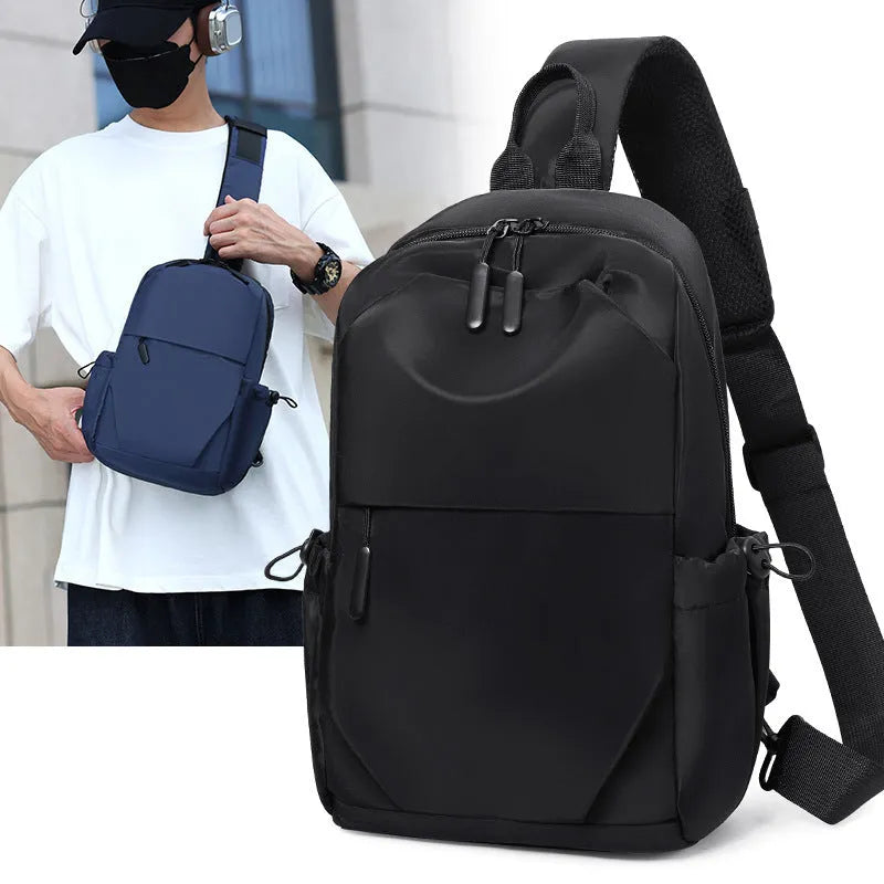Men's grey waterproof chest bag with shoulder strap showing 33cm height dimensions