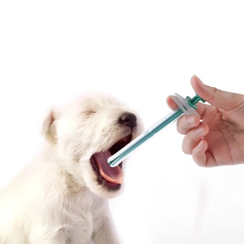 Two pet pill shooters with soft silicone tips for administering medication to cats and dogs
