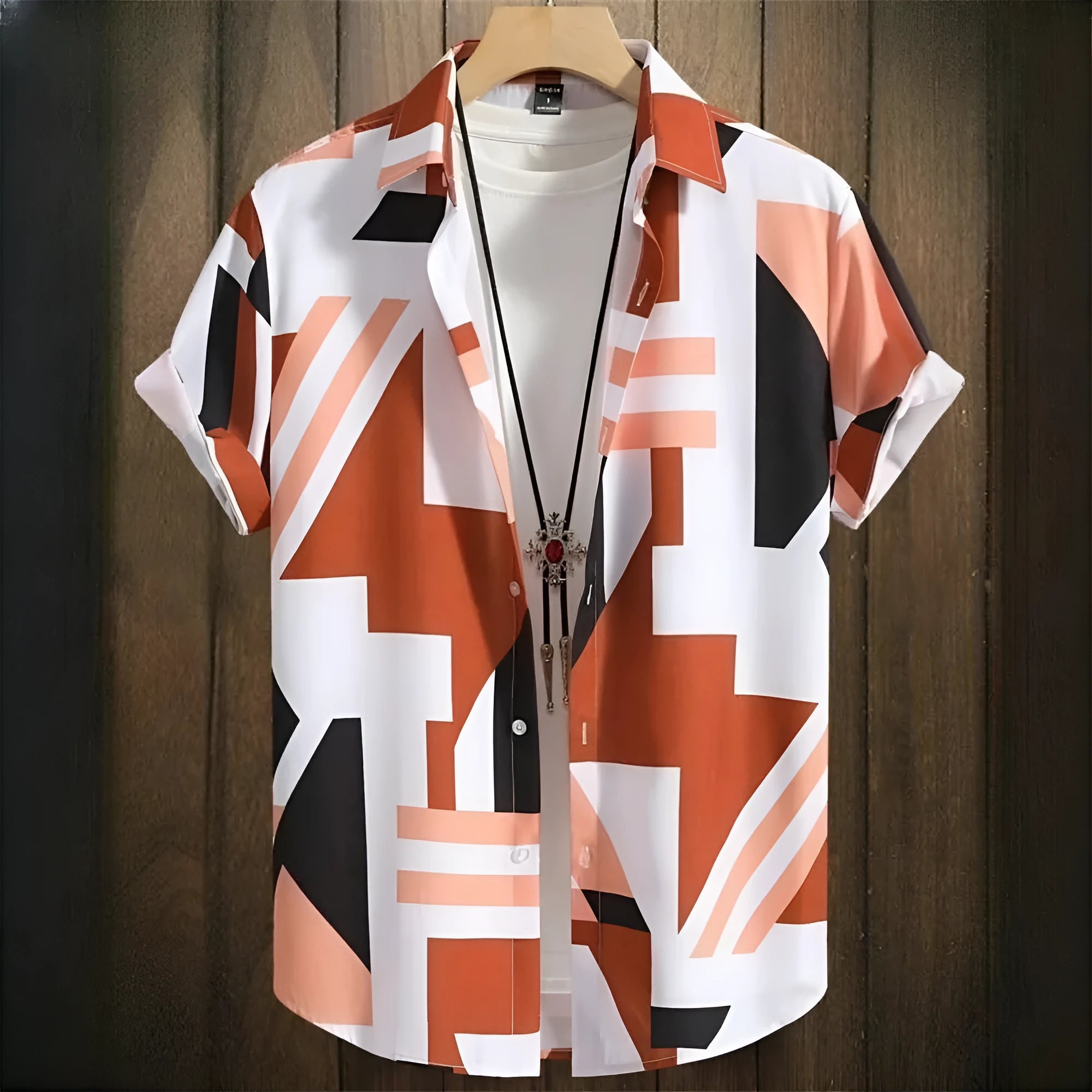 Men's grey camouflage print loose fit short sleeve casual shirt on a hanger.