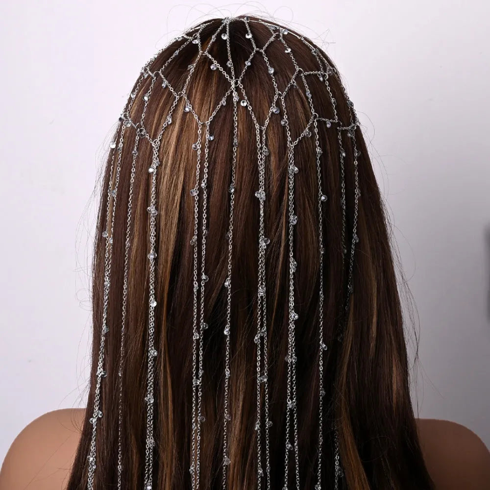 Gold and silver electroplated rhinestone headband with mesh design and tassel detailing