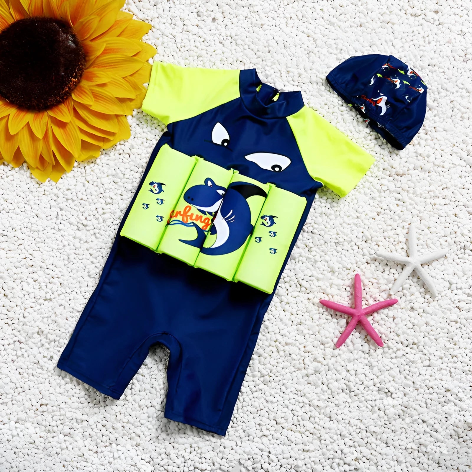 Children's buoyancy swimsuit with shark design showing one-piece swimwear with flotation features