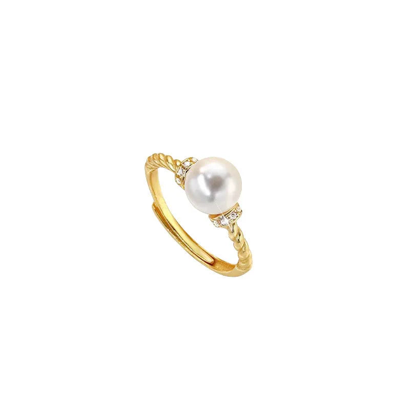 Adjustable copper pearl ring with geometric antique twist design in gold and silver finish options