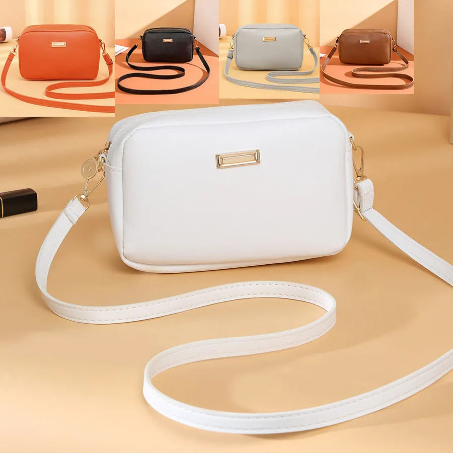 Solid colour PU ladies' shoulder bag with three-dimensional pockets in urban simplicity style