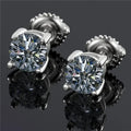 Silver four-claw screw-back stud earrings with a geometric moissanite stone.