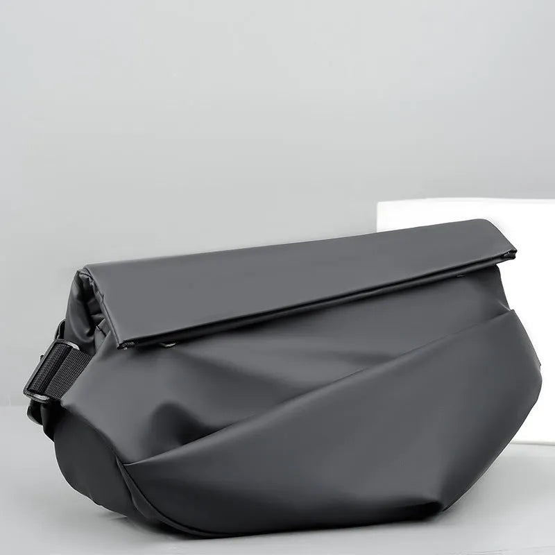 Grey PU leather crossbody bag showing internal phone pocket and document sleeve organisation