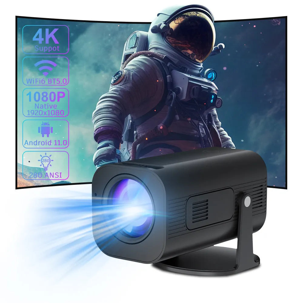 Black or white portable mini projector with remote control and power cord on plain background