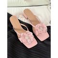 Korean style women's sandals with chunky heel, square toe, and satin upper in cream-white colour.